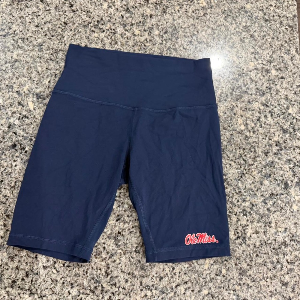 Navy blue align Lululemon biker shorts with red Ole Miss logo